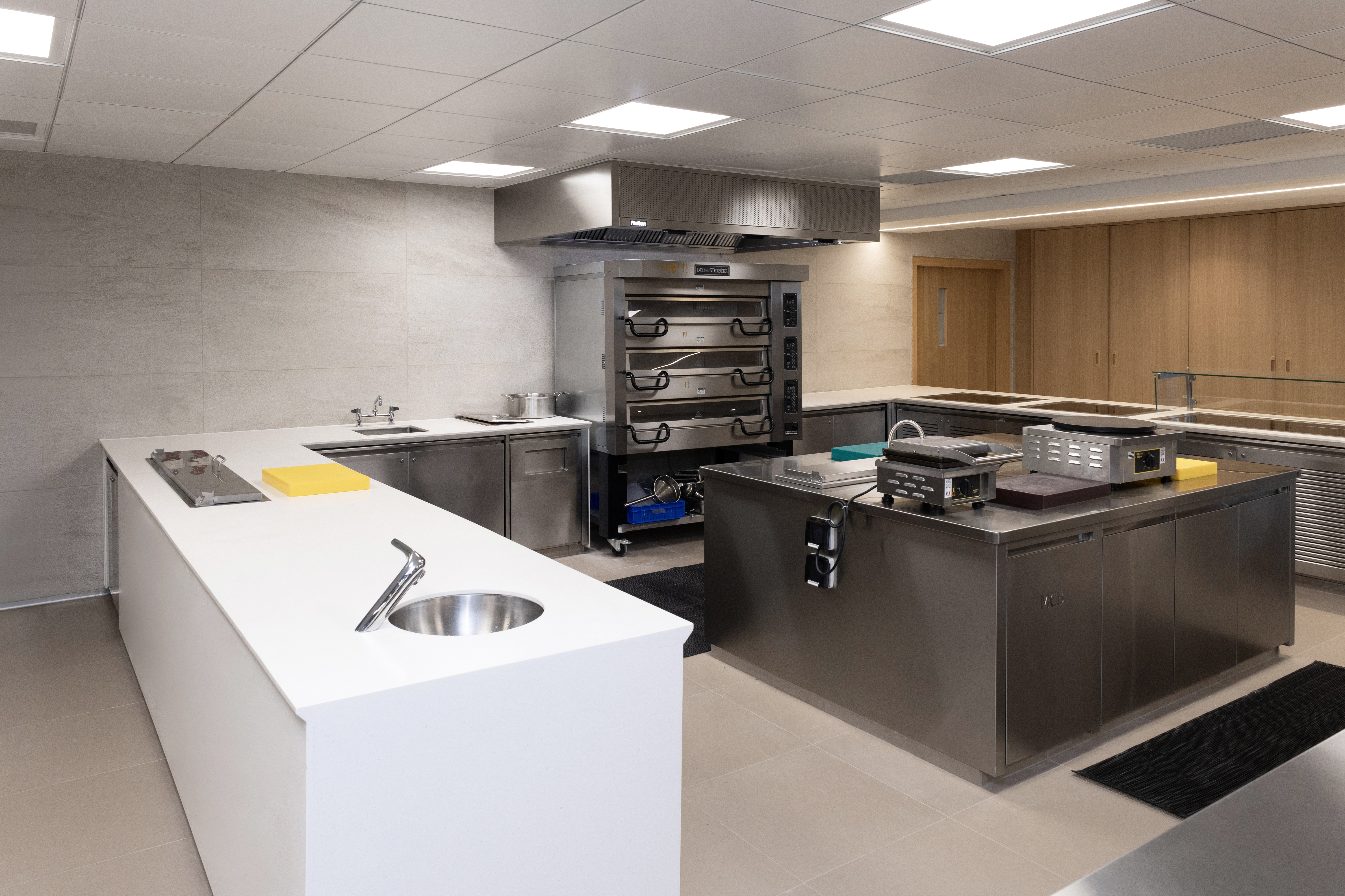 Commercial kitchen and café installation by Equinox Interiors in Bengaluru, view 04